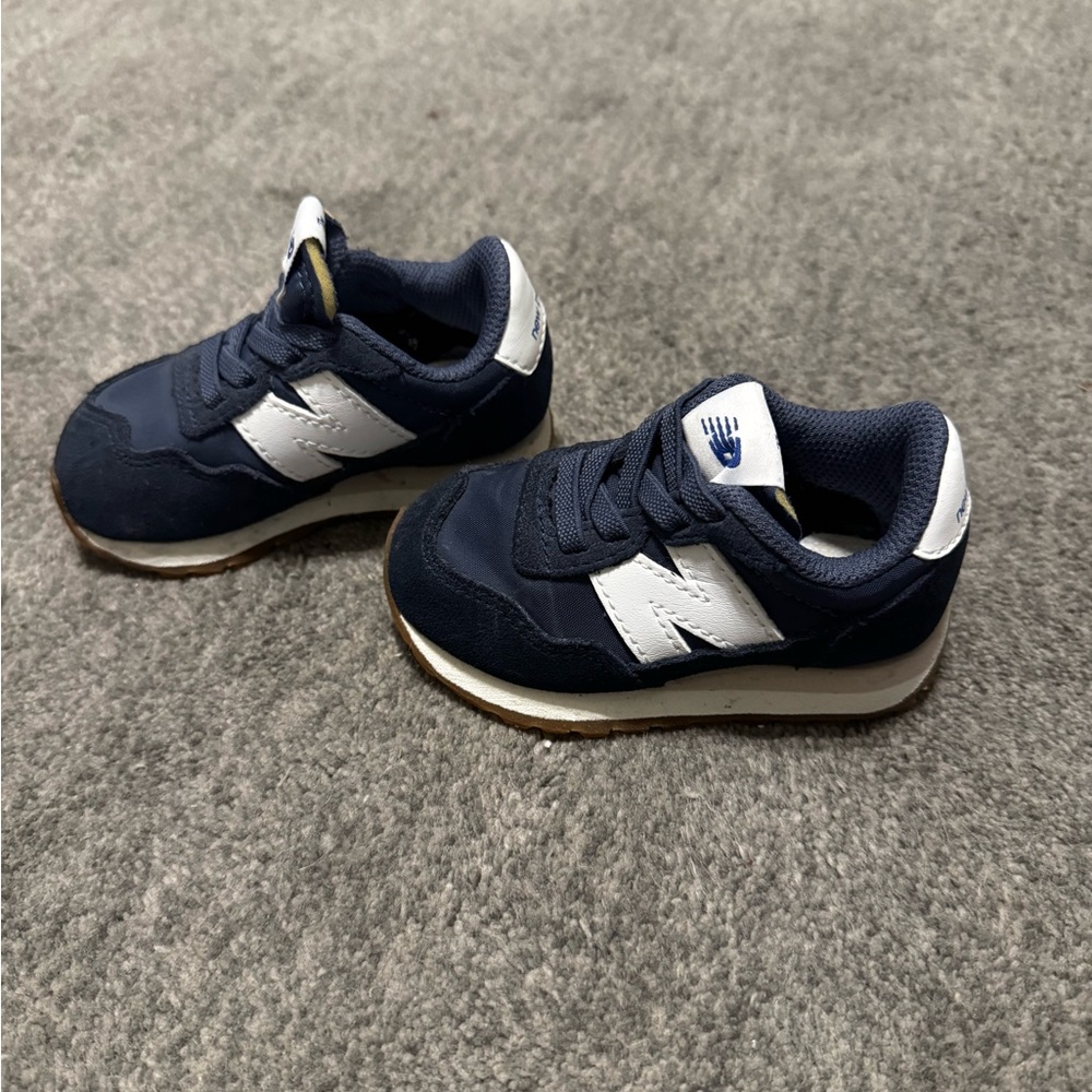 New Balance toddler Dark Blue and White Sneakers